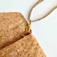 By The Sea Collection, hand strap detail hook of Aurora, gold vegan cork leather shoulder bag, clutch bag