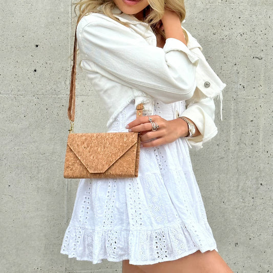 Model wearing By The Sea Collection, Flora, classic vegan cork leather shoulder bag