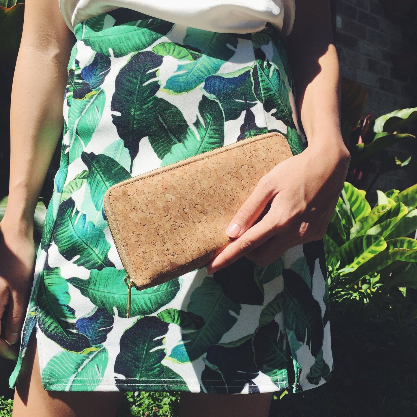 Women holding By The Sea Collection, Iggy, women’s vegan cork leather wallet