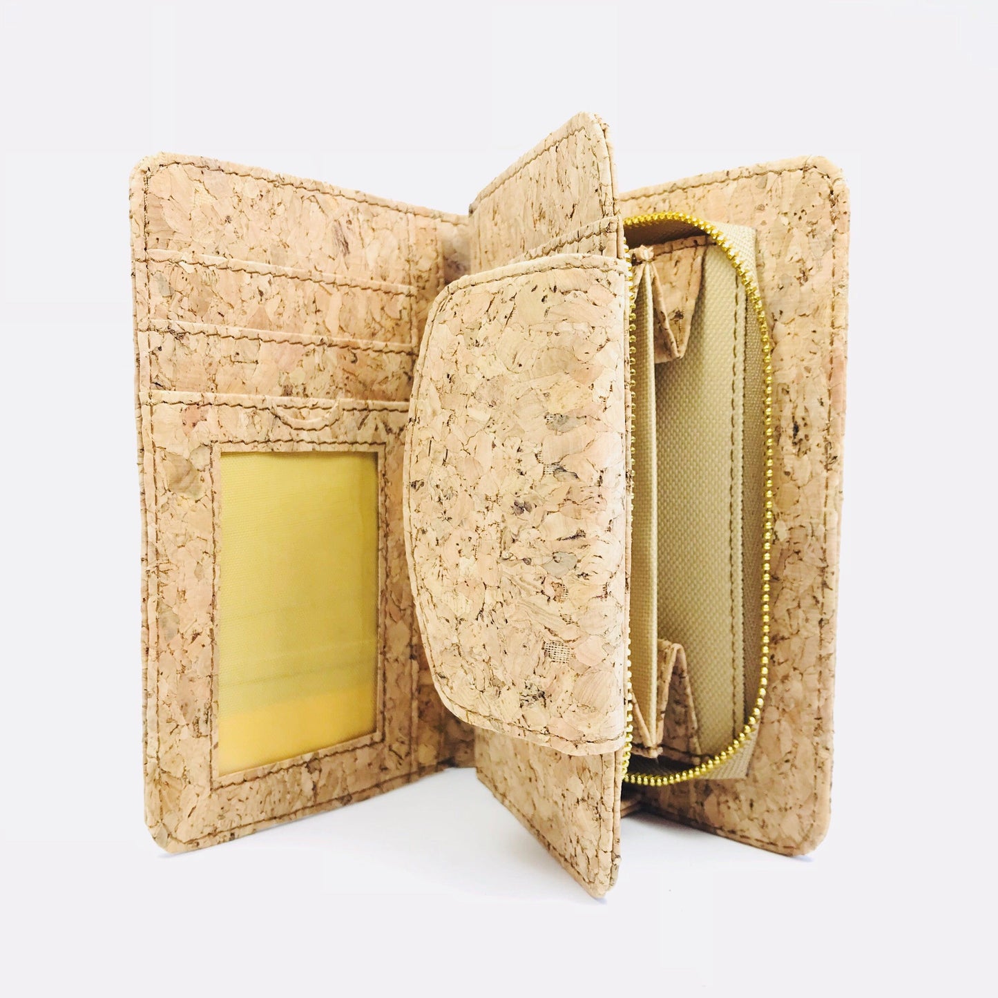 Interior of By The Sea Collection, Fiora, classic vegan cork leather wallet with ID window, card slots, side compartments and zipped coin compartment