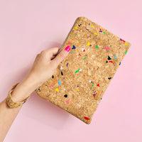 Woman using wristlet of By The Sea Collection, Annie, colourful vegan cork leather pouch