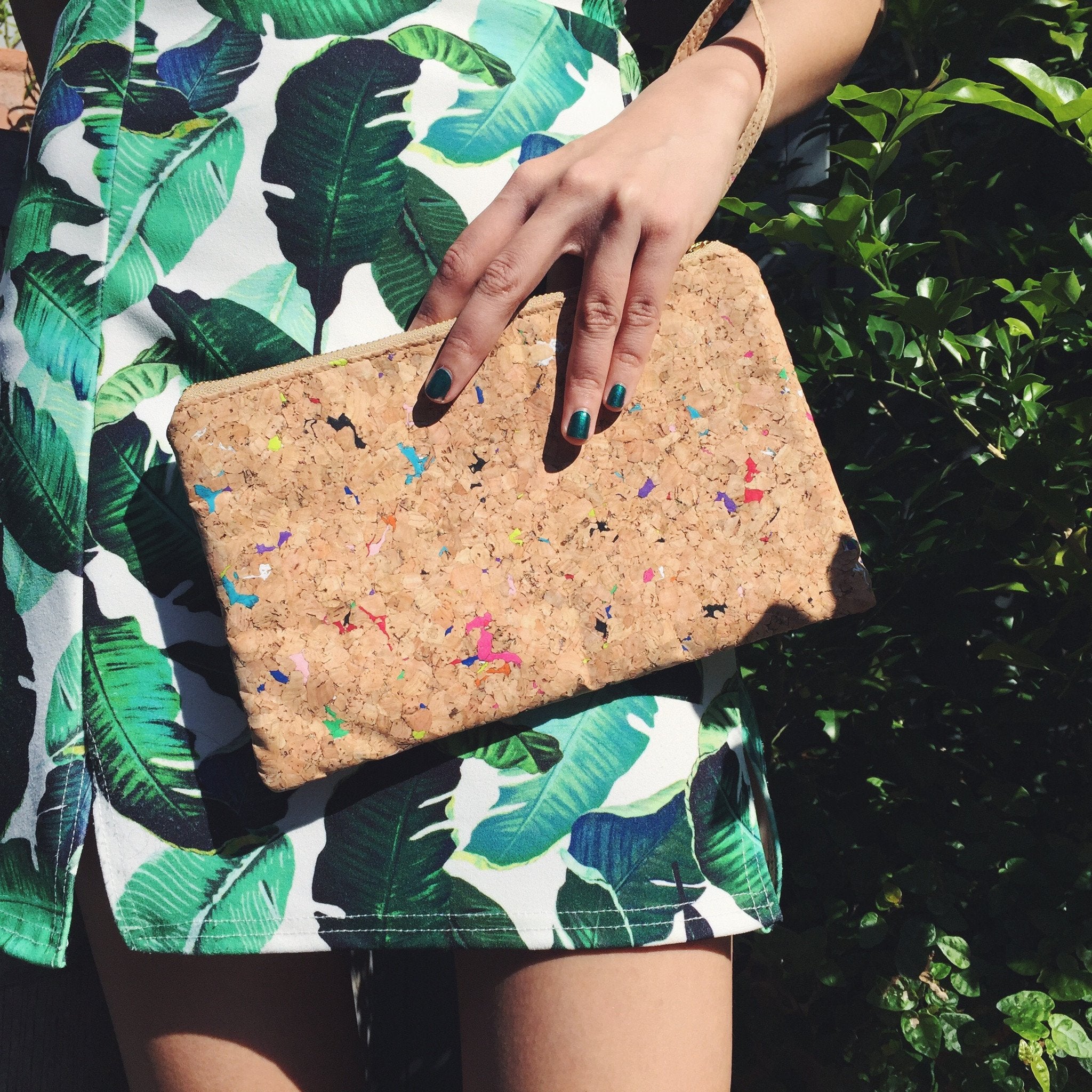 Woman holding By The Sea Collection, Annie, colourful vegan cork leather pouch