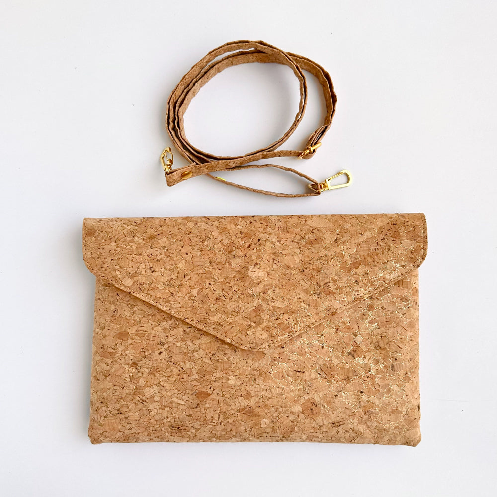 The product and detachable shoulder strap of By The Sea Collection, Aurora, gold vegan cork leather shoulder bag, clutch bag