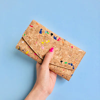 Hand holding By The Sea Collection, Emma, colourful women's vegan cork leather wallet