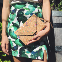 By The Sea Collection, model holding Flora as a clutch, colourful vegan cork leather shoulder bag, clutch bag
