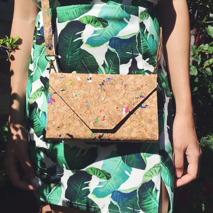 By The Sea Collection, model wearing Flora front view, colourful vegan cork leather shoulder bag, clutch bag
