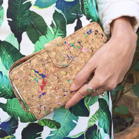 Women holding By The Sea Collection, Izzy, colourful vegan cork leather women's wallet 