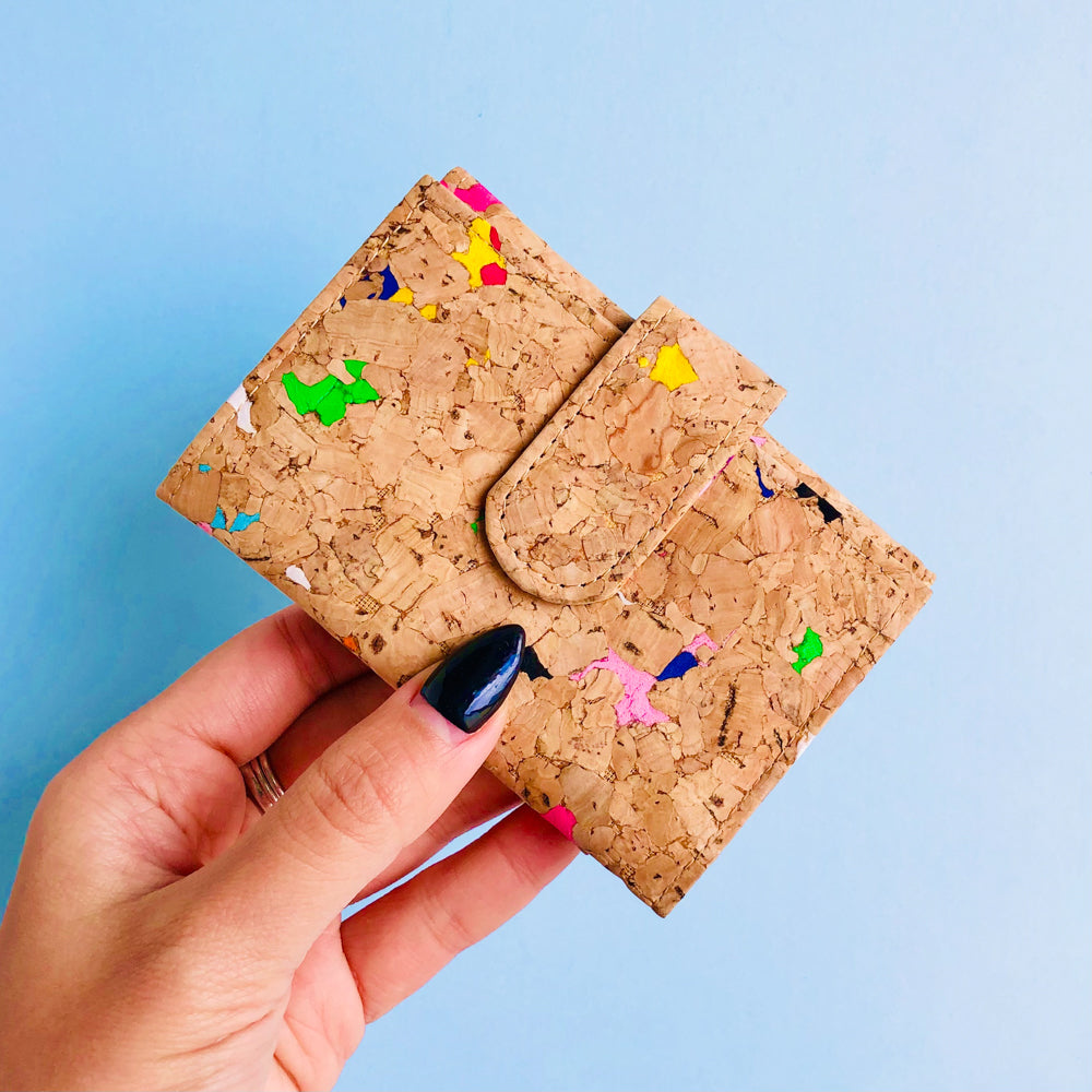 Model Holding By The Sea Collection, Kate, colourful vegan cork leather compact wallets