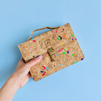 By The Sea Collection, model holding Kiki, colourful vegan cork leather mini shoulder bag