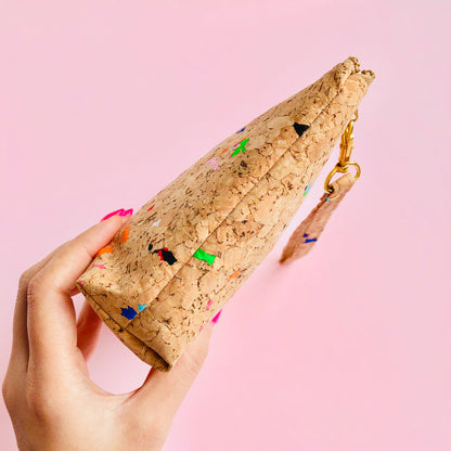 Woman holding By The Sea Collection, Miley, colourful vegan cork leather make up bag