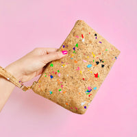 Woman using wristlet of By The Sea Collection, Miley, colourful vegan cork leather make up bag