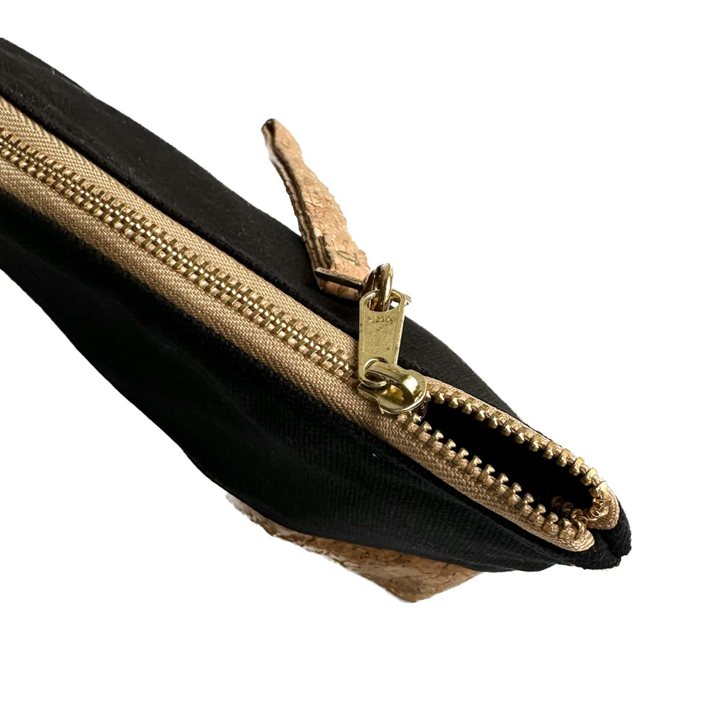 The zipper detail of By The Sea Collection, Miley, black canvas vegan cork leather make up bag
