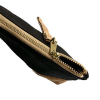 The zipper detail of By The Sea Collection, Miley, black canvas vegan cork leather make up bag