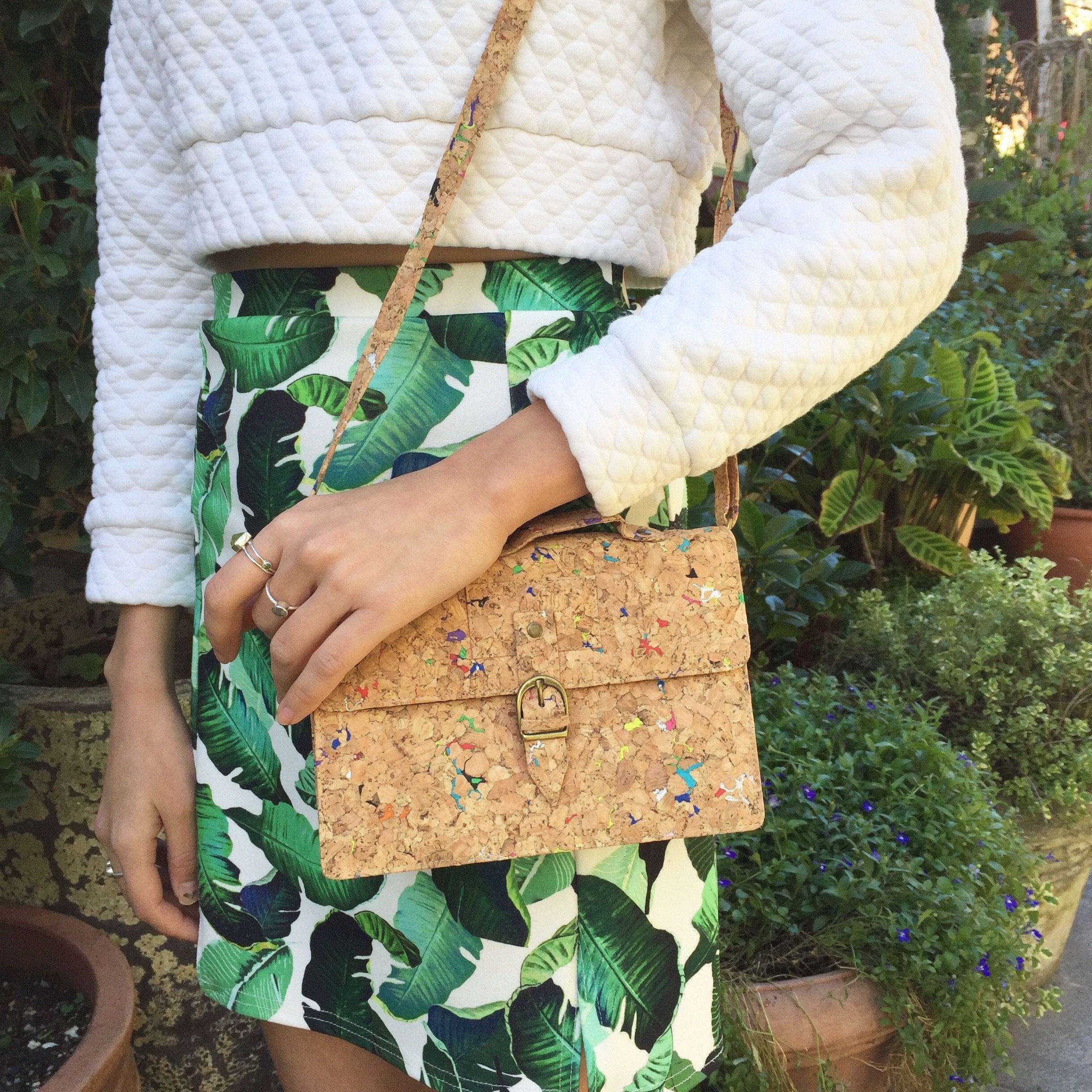 Model wearing By The Sea Collection, Kiki, colourful vegan cork leather mini shoulder bag
